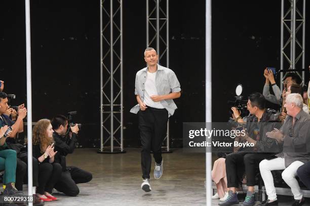 Lucas Ossendrijver walks the runway during the finale of Lanvin Menswear Spring/Summer 2018 show as part of Paris Fashion Week on June 25, 2017 in...