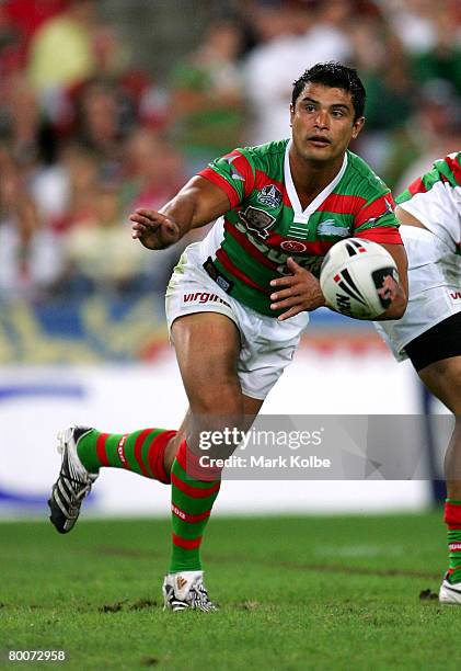 Craig Wing of the Rabbitohs passes the ball during the NRL Charity Shield match between the South Sydney Rabbitohs and the St George Illawarra...