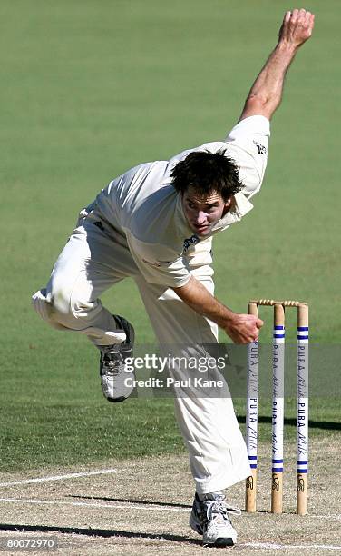 Ben Edmondson of the Warriors bowls during day two of the Pura Cup match between the Western Australian Warriors and the Victorian Bushrangers at the...