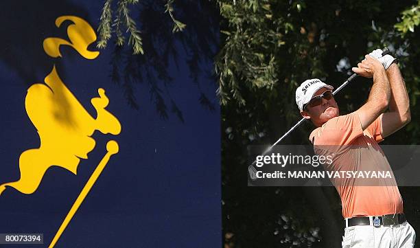 New Zealand golfer Mark Brown tees off on the sixteenth hole during the third round of the Johnnie Walker Classic 2008 in Gurgaon on the outskirts of...