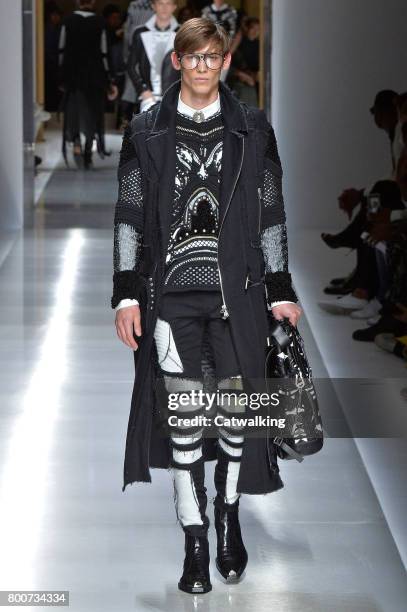 Model walks the runway at the Balmain Spring Summer 2018 fashion show during Paris Menswear Fashion Week on June 24, 2017 in Paris, France.