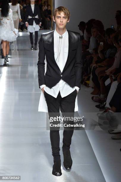 Model walks the runway at the Balmain Spring Summer 2018 fashion show during Paris Menswear Fashion Week on June 24, 2017 in Paris, France.