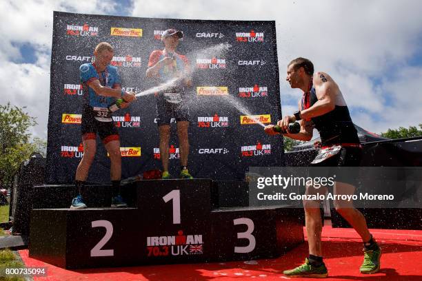 Second place athlete Max Hazell , first place athlete Marton Cseik and third pace athlete Oliver Burrows , all of them from Great Britain, pspread...