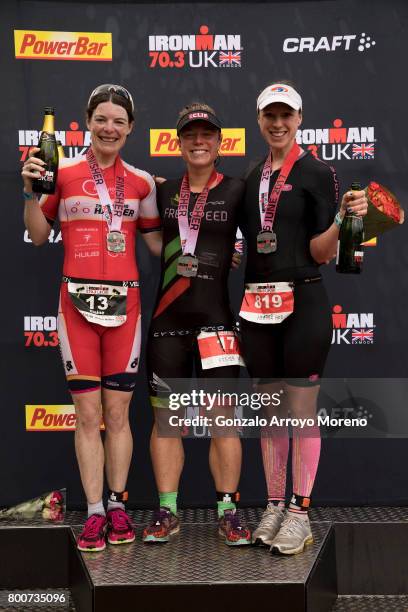 Second place athlete Elaine Garvican , first place athlete Ruth Purbroo and third pace athlete Heather Fell , all of them from Great Britain pose for...