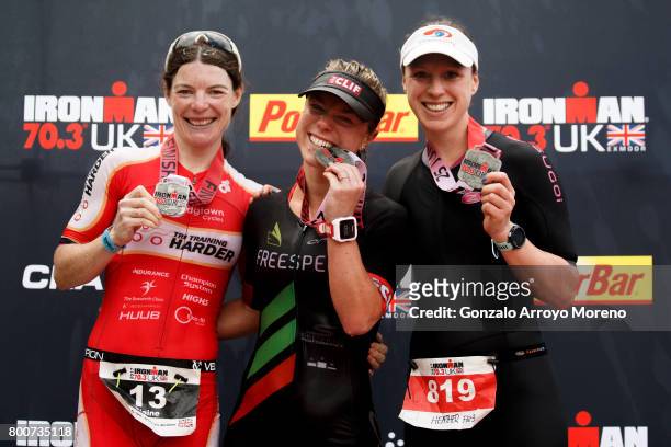 Second place athlete Elaine Garvican , first place athlete Ruth Purbroo and third pace athlete Heather Fell , all of them from Great Britain pose for...