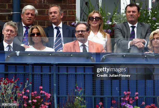 John Bercow, Speaker of the House of Commons and Philip Brook watch on during the mens singles final between Feliciano Lopez of Spain and Marin Cilic...