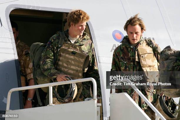 Prince Harry, army officer Cornet Wales, still wearing his flak jacket arrives by Tristar on his return to Britain at Royal Air Force RAF Brize...
