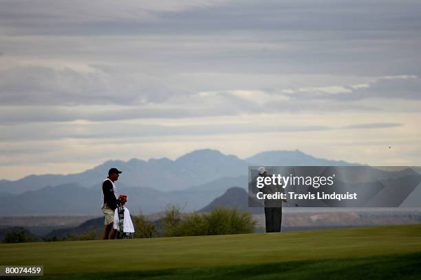 Tiger Woods watches a shot during the third round matches of the WGC-Accenture Match Play Championship at The Gallery at Dove Mountain on February...