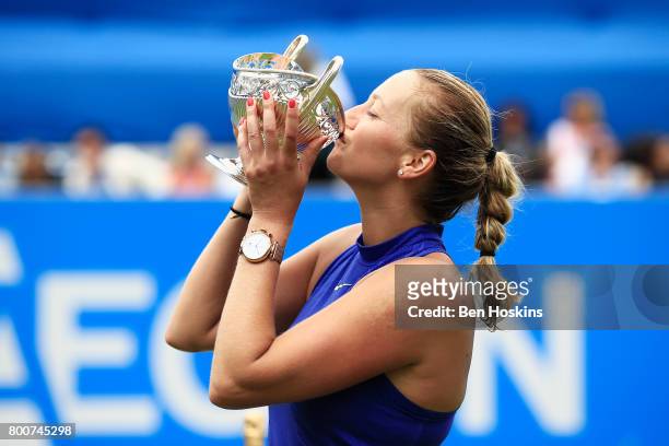 Petra Kvitova of the Czech Republic kisses the trophy after the Women's Singles final match against Ashleigh Barty on day seven of the Aegon Classic...