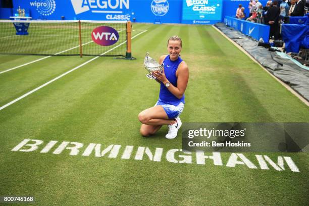 Petra Kvitova of the Czech Republic poses with the trophy after the Women's Singles final match against Ashleigh Barty on day seven of the Aegon...