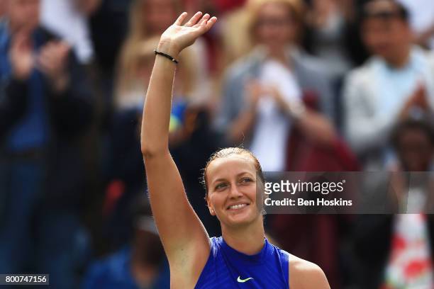 Petra Kvitova of the Czech Republic shows appreciation to the fans after her victory in the Women's Singles final match against Ashleigh Barty on day...