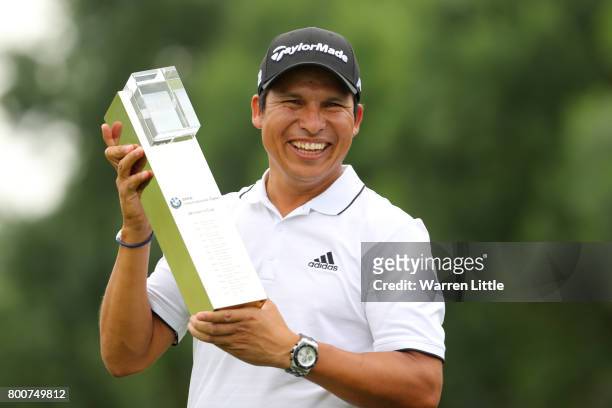 Andres Romero of Argentina poses with the trophy following his victory during the final round of the BMW International Open at Golfclub Munchen...