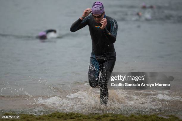 Athletes compete during the swimming course of the Ironman 70.3 UK Exmoor at Wimbleball Lake on June 25, 2017 in Somerset, United Kingdom.