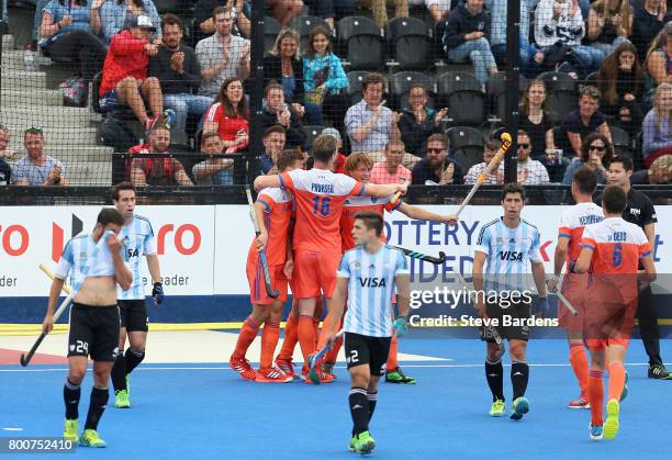 Valentin Verga of the Netherlands celebrates scoring their teams second goal with teammates during the final match between Argentina and the...