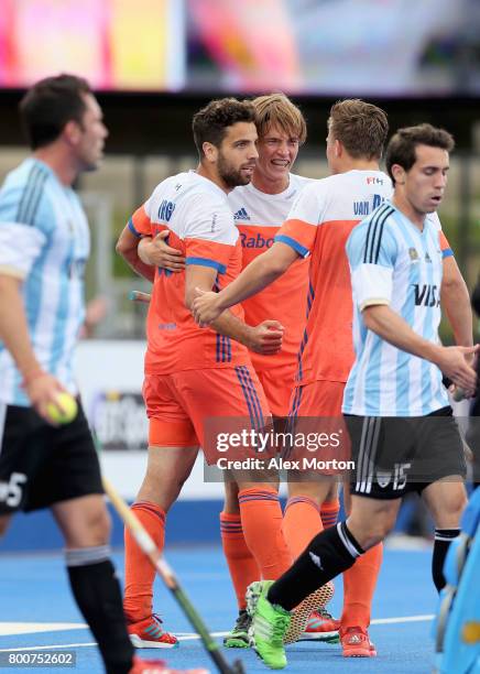 Valentin Verga of the Netherlands celebrates scoring their teams second goal with teammates during the final match between Argentina and the...