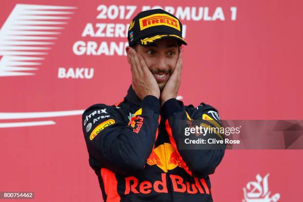 Race winner Daniel Ricciardo of Australia and Red Bull Racing celebrates his win on the podium during the Azerbaijan Formula One Grand Prix at Baku...