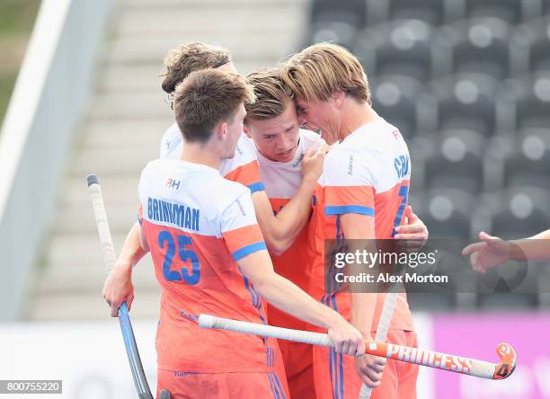 Thijs van Dam of the Netherlands celebrates scoring their teams third goal with teammates during the final match between Argentina and the...