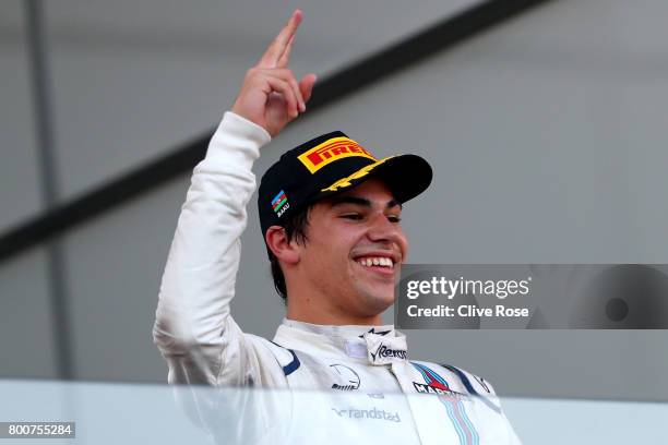 Third placed finisher Lance Stroll of Canada and Williams celebrates on the podium during the Azerbaijan Formula One Grand Prix at Baku City Circuit...