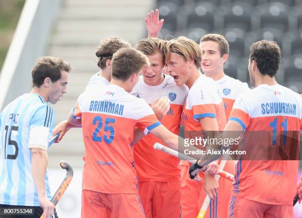 Thijs van Dam of the Netherlands celebrates scoring their teams third goal with teammates during the final match between Argentina and the...