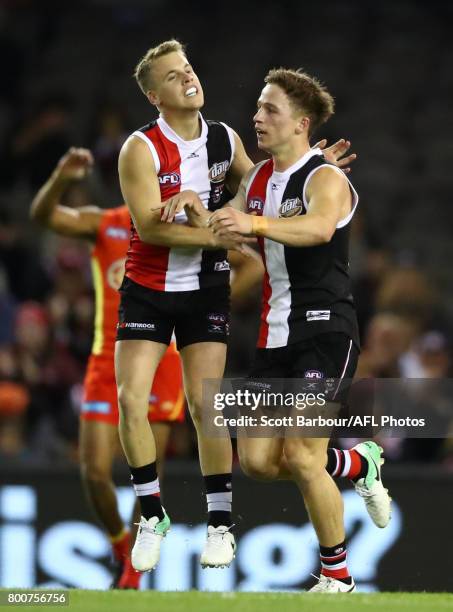 Jack Billings of the Saints celebrates after kicking a goal with Jack Lonie of the Saints during the round 14 AFL match between the St Kilda Saints...