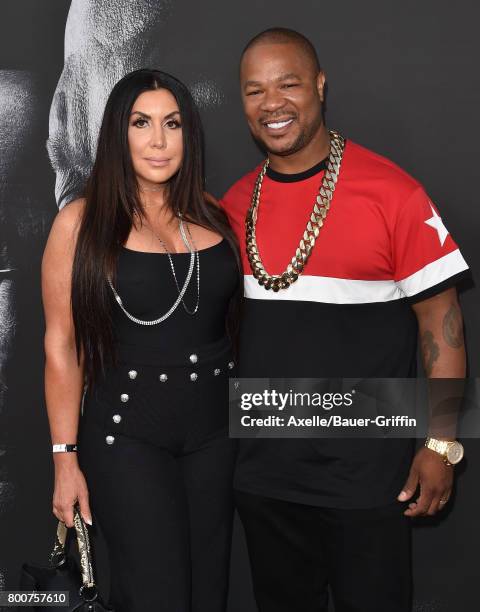 Rapper Xzibit and wife Krista Joiner arrive at the premiere of 'The Defiant Ones' at Paramount Theatre on June 22, 2017 in Hollywood, California.