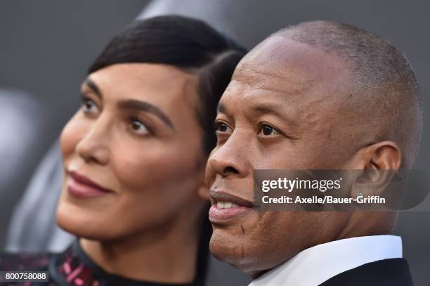 Rapper/producer Dr. Dre and wife Nicole Young arrive at the premiere of 'The Defiant Ones' at Paramount Theatre on June 22, 2017 in Hollywood,...
