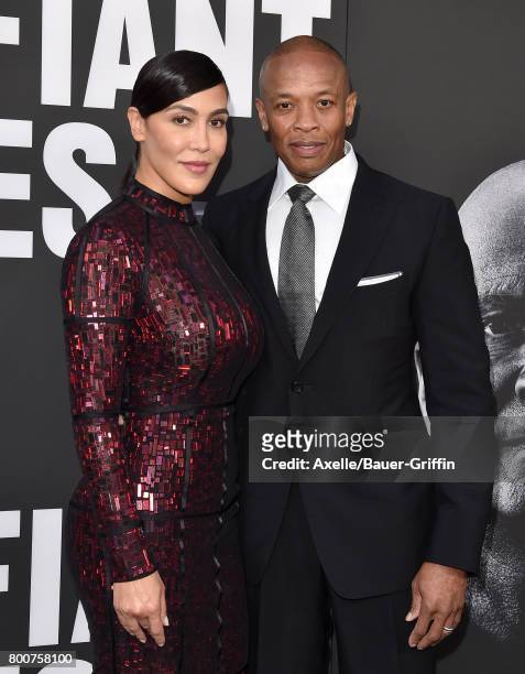 Rapper/producer Dr. Dre and wife Nicole Young arrive at the premiere of 'The Defiant Ones' at Paramount Theatre on June 22, 2017 in Hollywood,...