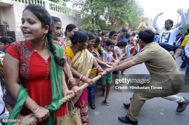 Devotees of Lord Krishna take out a procession of Lord Jagannath Ratha Yatra, chanting Hare Krishna Maha Mantra, on June 25, 2017 in Noida, India....