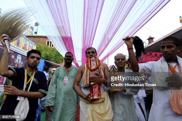 Devotees of Lord Krishna take out a procession of Lord Jagannath Ratha Yatra, chanting Hare Krishna Maha Mantra, on June 25, 2017 in Noida, India....