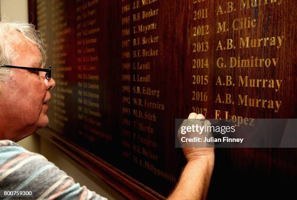 The name of winner, Feliciano Lopez of Spain is engraved following his victory in the mens singles final against Marin Cilic of Croatia during day...