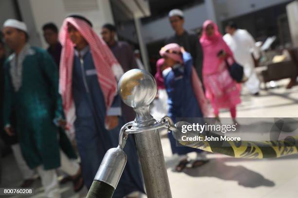 Muslims depart a prayer service celebrating Eid-al-Fitr on June 25, 2017 in Stamford, Connecticut. The Islamic holiday celebrates the end of the...