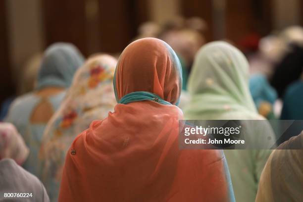 Muslims attend a prayer service celebrating Eid-al-Fitr on June 25, 2017 in Stamford, Connecticut. The Islamic holiday celebrates the end of the...