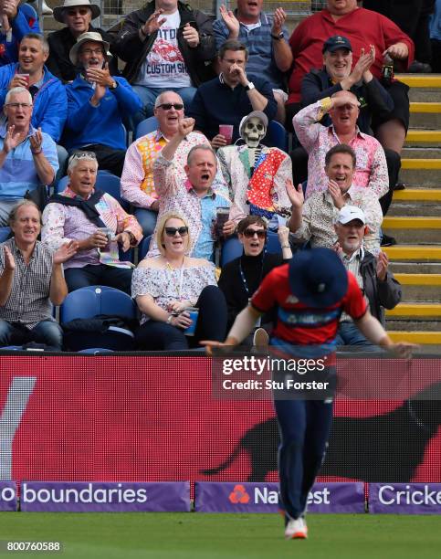 Spectators bring a skeleton to the match and celebrate a wicket during the 3rd NatWest T20 International between England and South Africa at SWALEC...