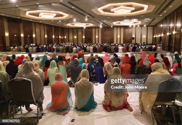 Muslims attend a prayer service celebrating Eid-al-Fitr on June 25, 2017 in Stamford, Connecticut. The Islamic holiday celebrates the end of the...
