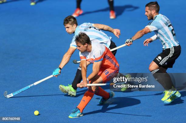 Bjorn Kellerman of the Netherlands attempts a reverse shot during the final match between Argentina and the Netherlands on day nine of the Hero...