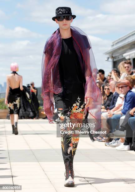 Model walks the runway during the Rynshu Menswear Spring/Summer 2018 show as part of Paris Fashion Week on June 25, 2017 in Paris, France.