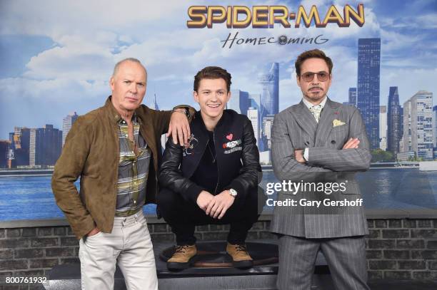 Actors Michael Keaton, Tom Holland and Robert Downey Jr. Attend the "Spiderman: Homecoming" New York photo call at the Whitby Hotel on June 25, 2017...