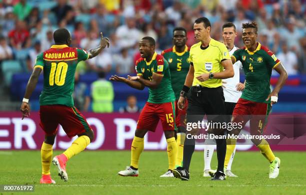 Vincent Aboubakar of Cameroon argues with referee Wilmar Roldan during the FIFA Confederations Cup Russia 2017 Group B match between Germany and...