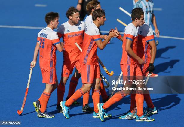 Bjorn Kellerman of the Netherlands celebrates scoring their teams sixth goal with teammates during the final match between Argentina and the...