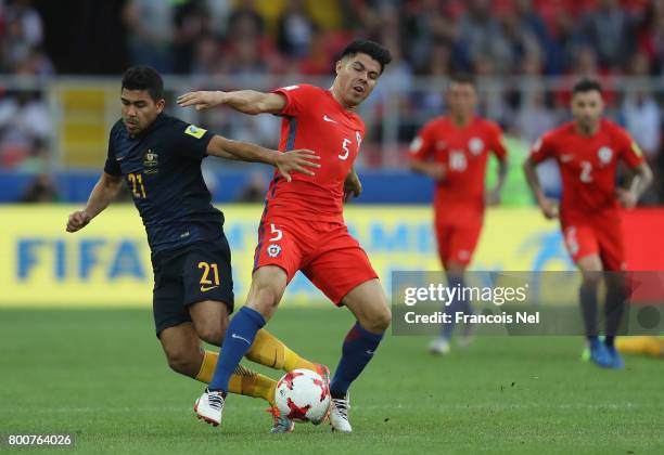 Massimo Luongo of Australia and Francisco Silva of Chile battle for possession during the FIFA Confederations Cup Russia 2017 Group B match between...