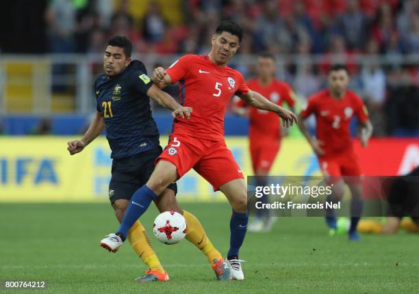 Massimo Luongo of Australia and Francisco Silva of Chile battle for possession during the FIFA Confederations Cup Russia 2017 Group B match between...