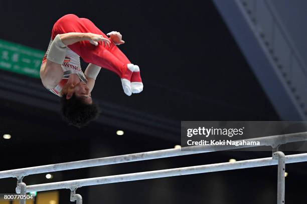 Ryohei Kato competes in the Parallel Barsduring Japan National Gymnastics Apparatus Championships at the Takasaki Arena on June 25, 2017 in Takasaki,...