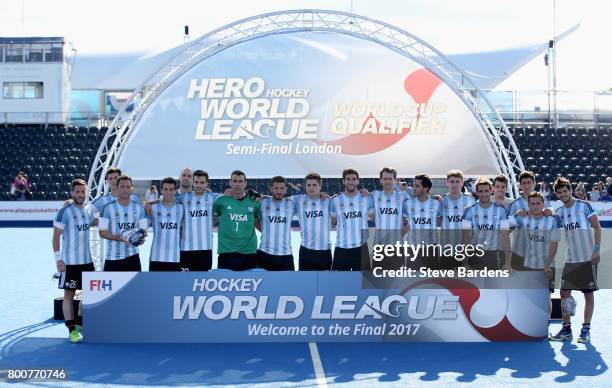 Argentina players pose with their runners up trophy after the final match between Argentina and the Netherlands on day nine of the Hero Hockey World...