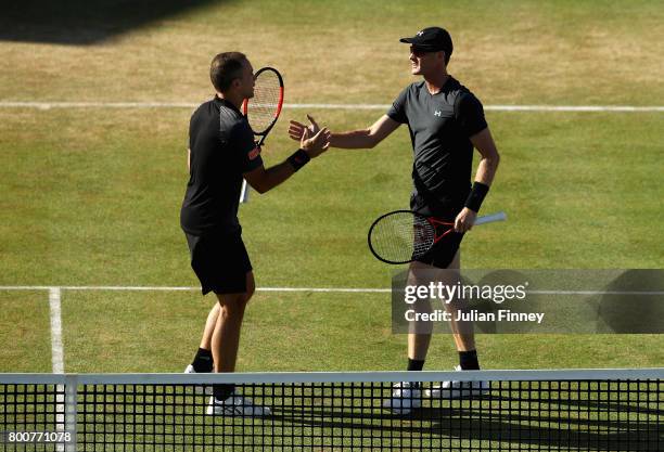 Jamie Murray of Great Britain and Bruno Soares of Brazil celebrate victory during the mens singles semi-final match against Marcin Matkowski of...