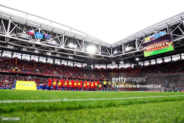 The two teams line up for the national anthems ahead of the FIFA Confederations Cup Russia 2017 Group B match between Chile and Australia at Spartak...