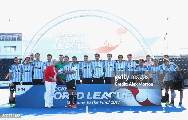 Pedro Ibarra of Argentina recieves their runners up trophy after the final match between Argentina and the Netherlands on day nine of the Hero Hockey...