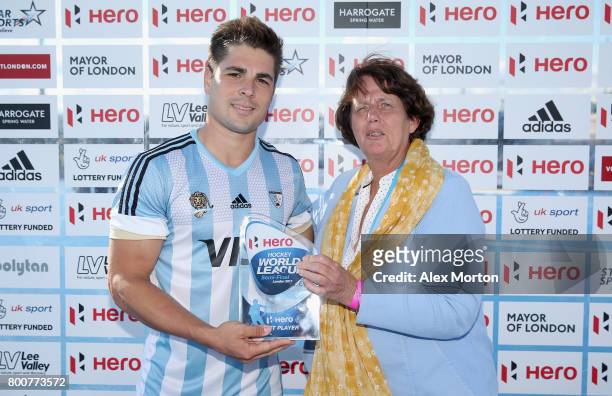 Gonzalo Peillat of Argentina is presented with his Best Player trophy after the final match between Argentina and the Netherlands on day nine of the...