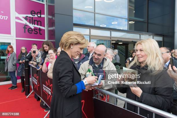 Actress Juliet Stevenson signs autographs for fans during a photocall for the European Premiere of 'Let Me Go' during the 71st Edinburgh...