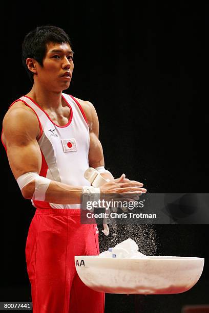Hisashi Mizutori of Japan prepares to perform on the still rings during the 2008 Tyson American Cup on March 1, 2008 at Madison Square Garden in New...