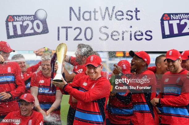 England captain Eoin Morgan and his team celebrate after the 3rd NatWest T20 International between England and South Africa at SWALEC Stadium on June...